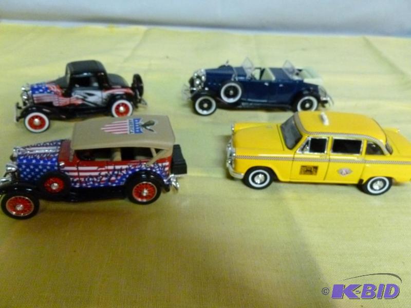 lot 207 image: Lot of four collectible 132 scale die cast m...