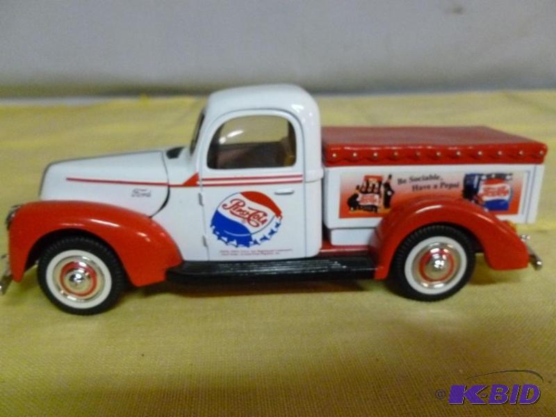 lot 215 image: Golden Wheel 1940 Ford Pepsi-Cola 124 scale ...