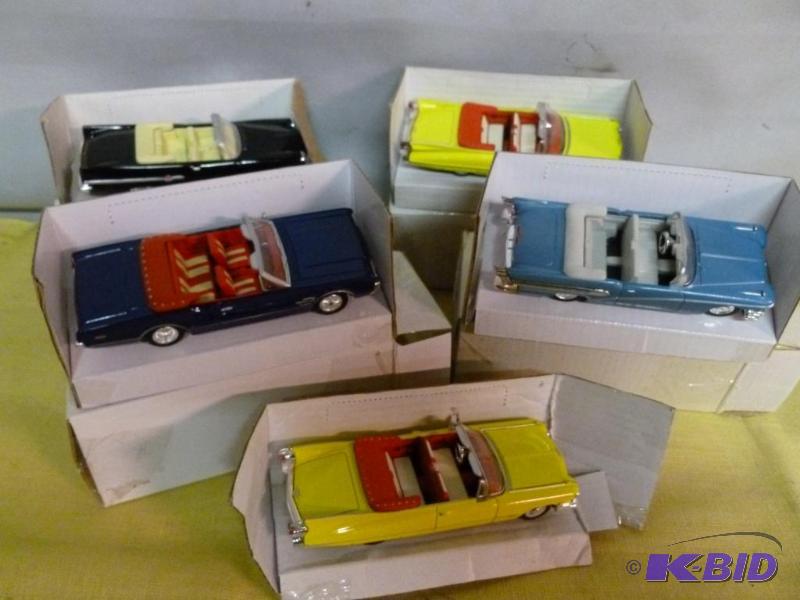 lot 240 image: Lot of five collectible 143 scale die cast m...
