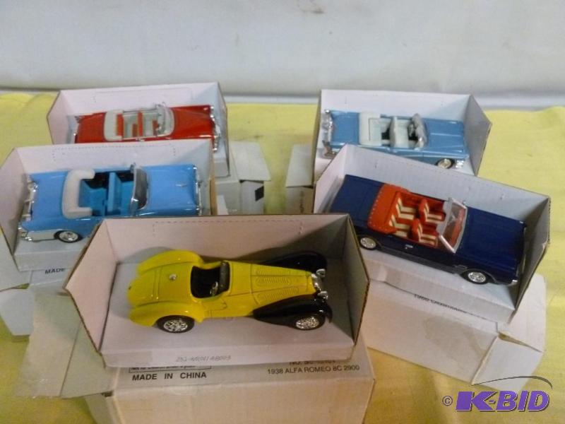 lot 241 image: Lot of five collectible 143 scale die cast m...