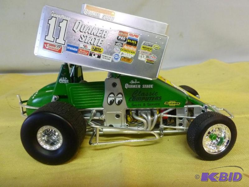 lot 73 image: GMP #11 Quaker State 124 scale die cast meta...