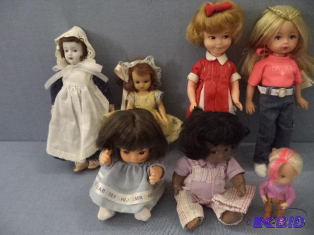 Eight Small Dolls