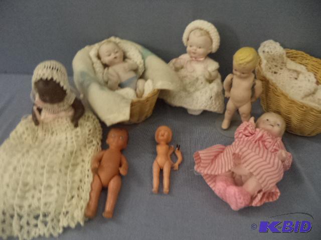 Seven Small Dolls