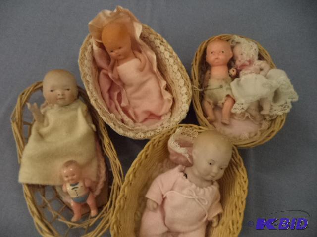 Six Baby Dolls In Baskets