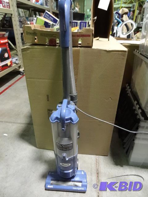 lot 12 image: Shark Navigator light vacuum. Store return. W...