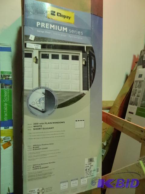 lot 4 image: Clopay premium garage door. Model 2050. 8 x 7...