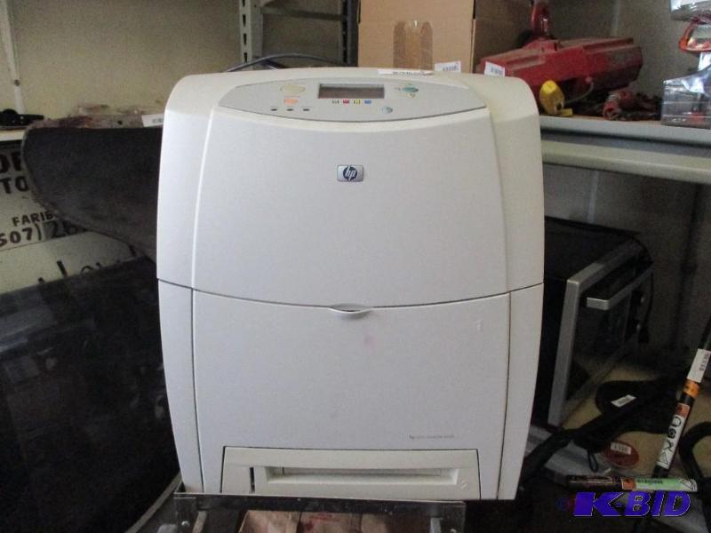lot 15 image: HP 4600 Laser printer, comes with cartridges ...