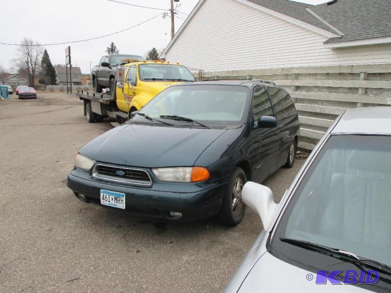 lot 4 image: Year 1998 Make Ford Model Windstar Vehicle...