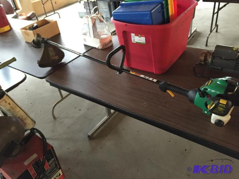 lot 125 image: Weed Eater gas weed whip. Motor has compressi...