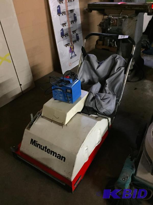lot 15 image: Minuteman 24v floor sweeper with battery char...
