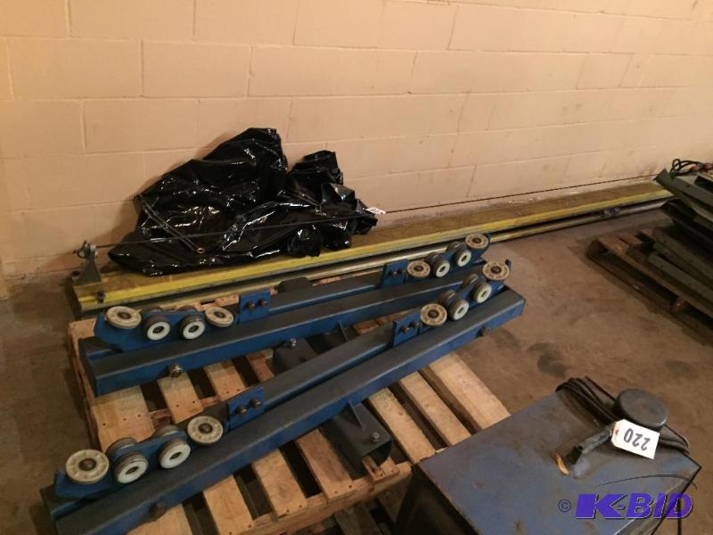 lot 219 image: Large beam with 2 trolleys....