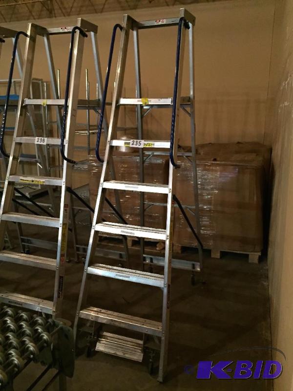 lot 235 image: Louisville safety step warehouse ladder on ca...