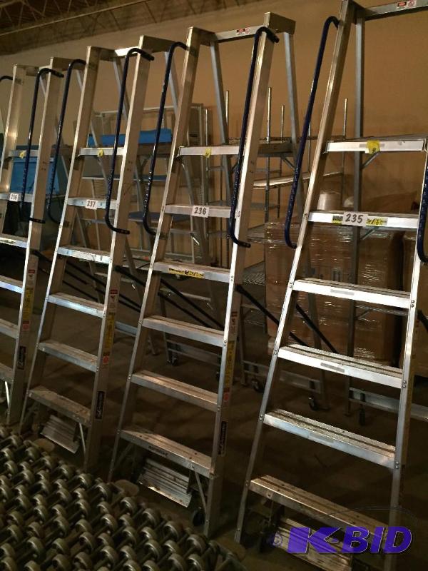 lot 236 image: Louisville safety step warehouse ladder on ca...