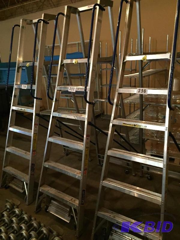 lot 237 image: Louisville safety step warehouse ladder on ca...