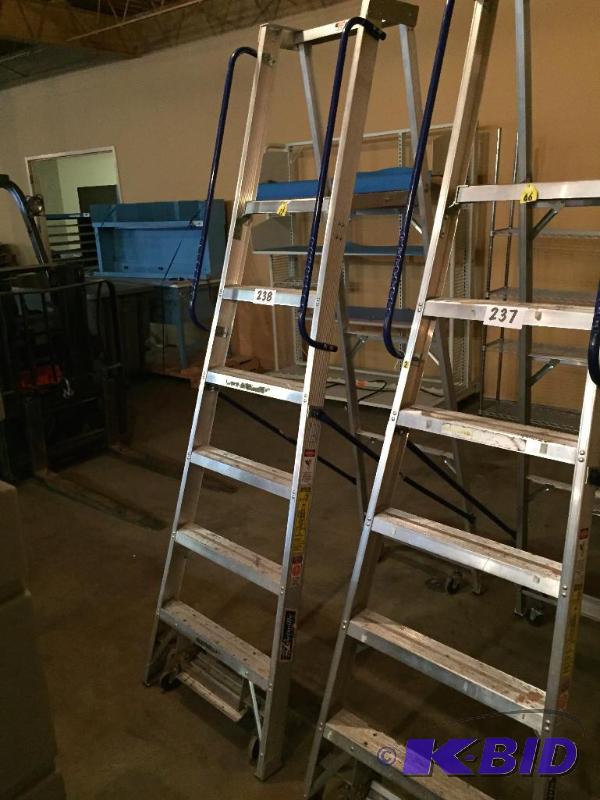 lot 238 image: Louisville safety step warehouse ladder on ca...