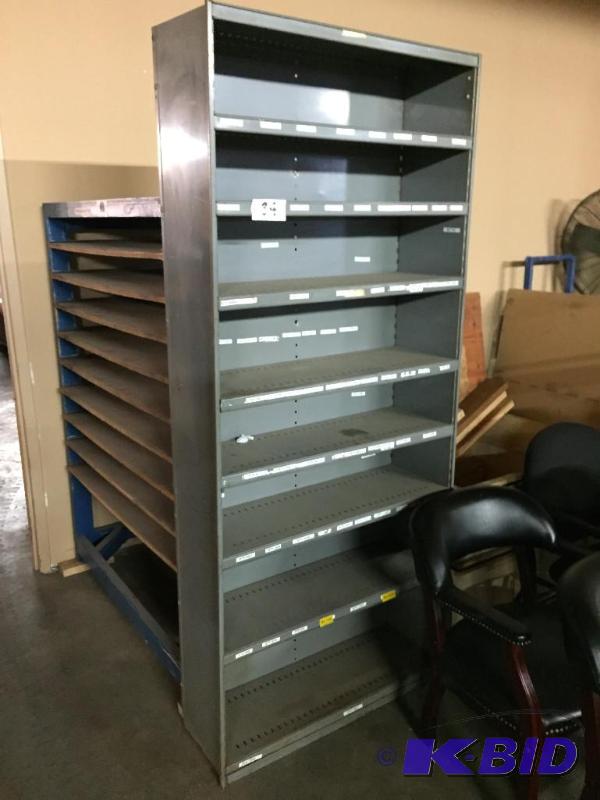 lot 34 image: Tall metal shelving unit....