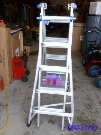 Werner multi ladder. 21 over all 300 lb rati...
