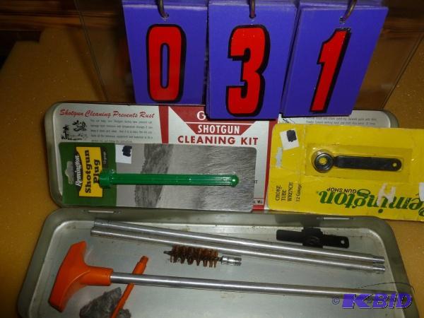 lot 31 image: Outers shot gun cleaning kit with plug and ch...