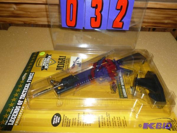 lot 32 image: M16 replica toy gun. Approx 12 long. New in ...