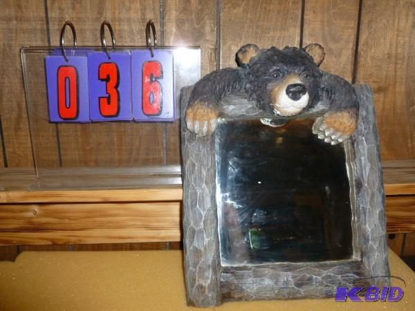 lot 36 image: Mirror with a bear frame. Nice condition. For...