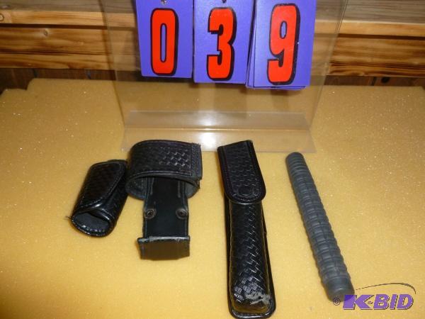 lot 39 image: Misc. policesecurity items. Steel baton with...