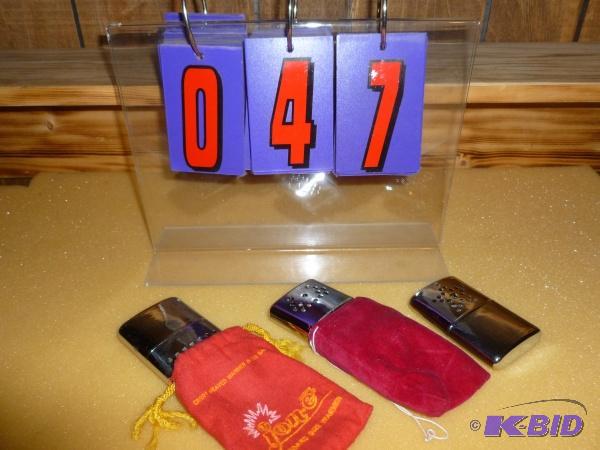 lot 47 image: 3 hand warmers. As shown. Lighter fluid style...