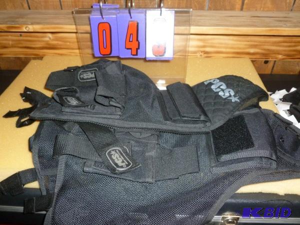 lot 49 image: Paintball tactical vest. Has multi pockets. L...