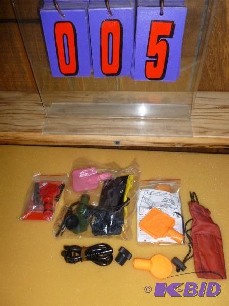 lot 5 image: Misc. sleeves and paintball barrel plugs. Mos...