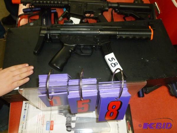 lot 58 image: Tippmann hk style air soft gun. Spring design...