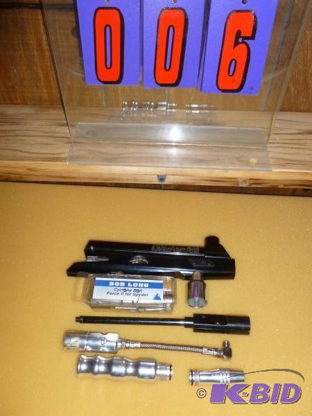 lot 6 image: Spyder bolt and misc. paintball gun parts. As...