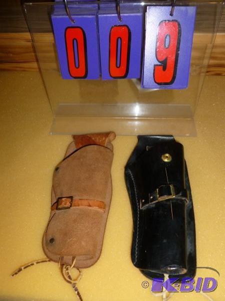 lot 9 image: 2 leather western style holsters. Used condit...