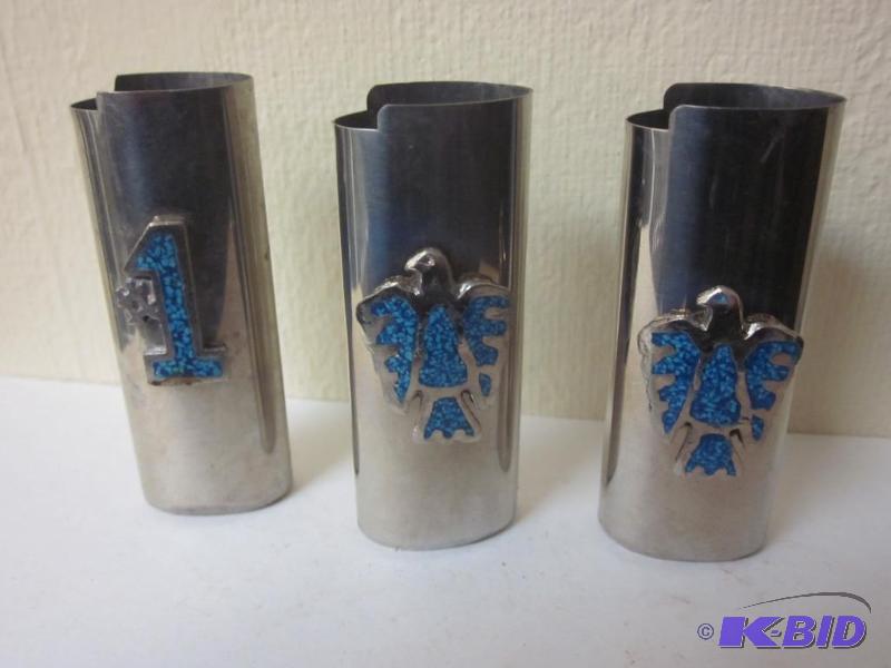 lot 31 image: Lot of (3) metal and turquoise lighter sleeve...