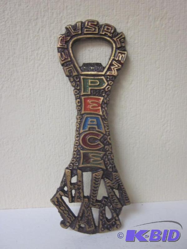 lot 45 image: Jerusalem brass and enamel bottle opener.  &n...