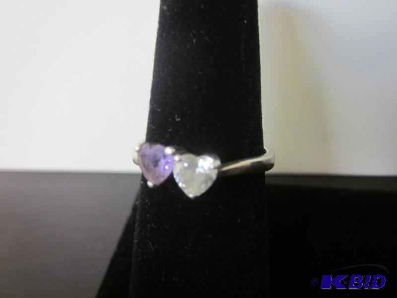 lot 6 image: Double stone heart purple and clear stones, m...
