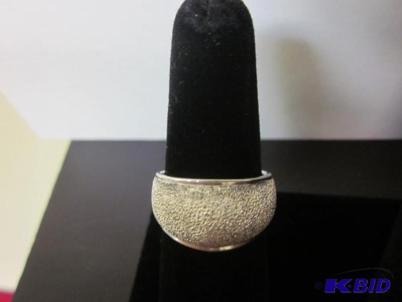 lot 7 image: .925 Sterling silver ring.      ...