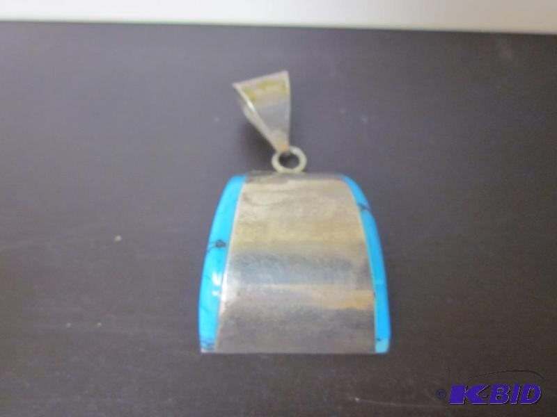 lot 9 image: Large Sterling Silver and turquoise moon shap...