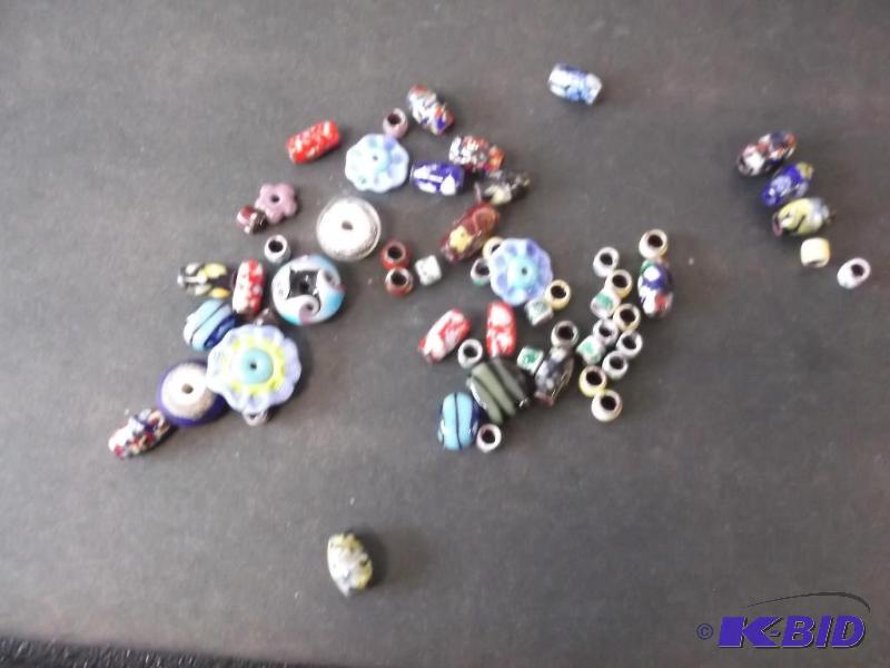 Hand made glass &amp enamel beads....