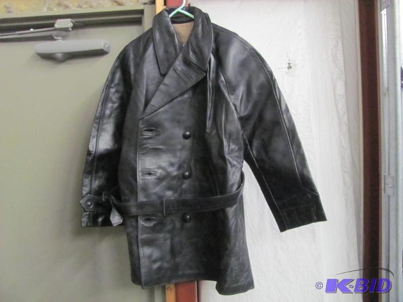 lot 49 image: This Italian Police Leather Jacket is a mens...
