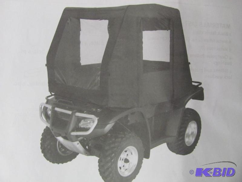 lot 7 image: This NEW (in original box) GUIDE GEAR ATV Cab...