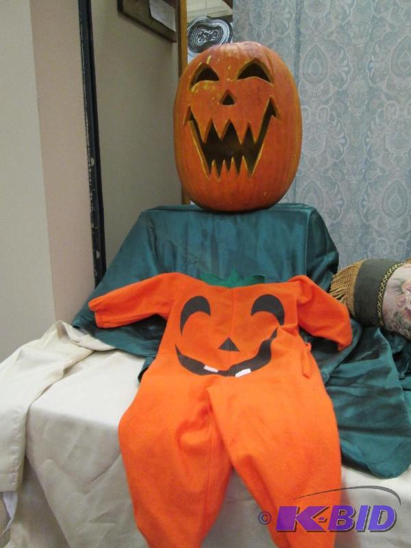 Large pumpkin and pumpkin costume...