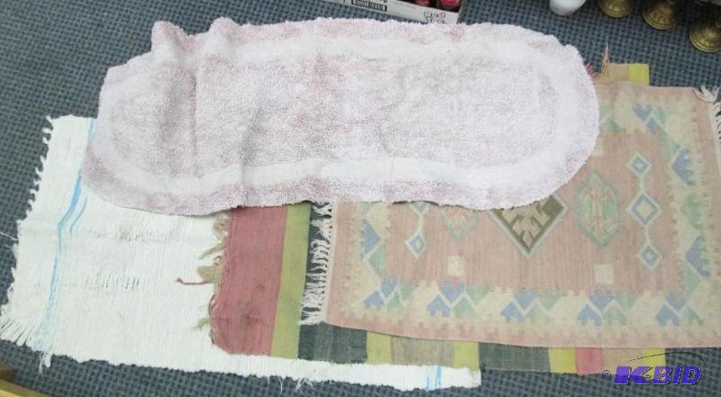 Qty 4 different size and kinds of rugs...