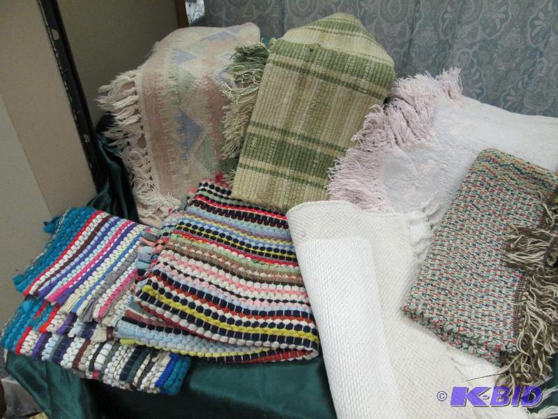 Qty 7 different size and colors of rugs...
