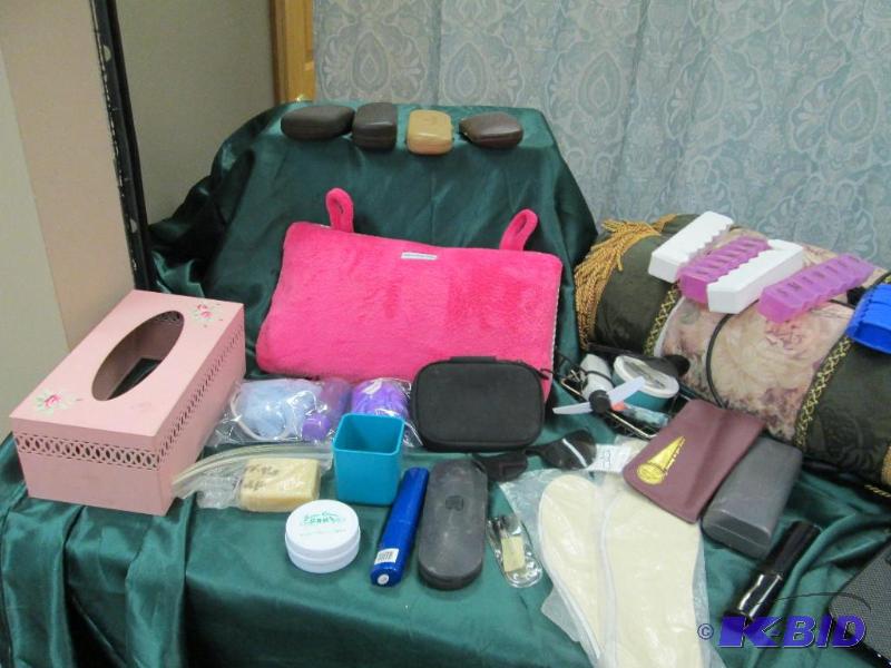 Different kinds of pill containers, eye glass...