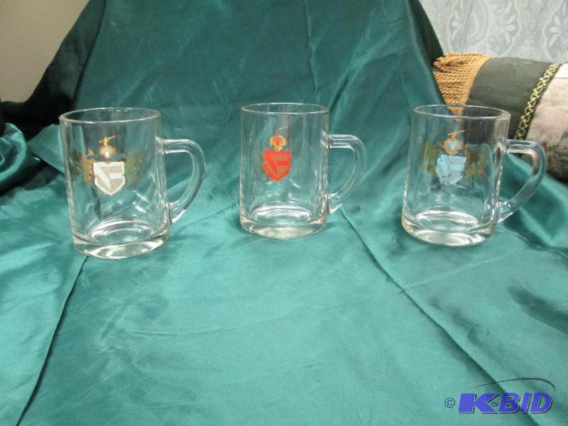 3 glass mugs with design on them...