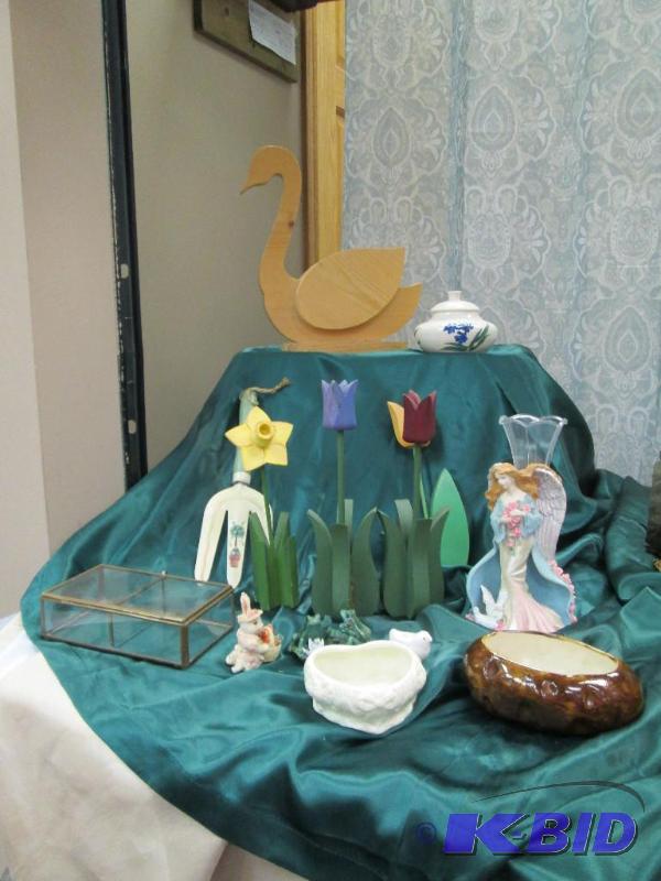 Wooden duck, wooden flowers, an angle , frogs...