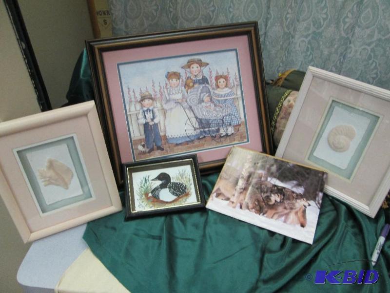Picture of loon, of shells, a family, and wol...
