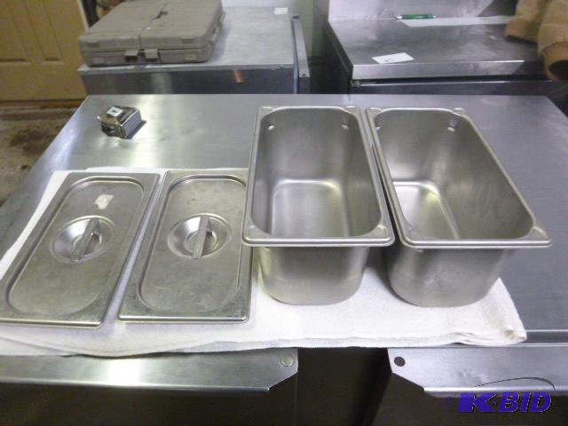 lot 22 image: Two Stainless Steel Pans with Lids Third size...
