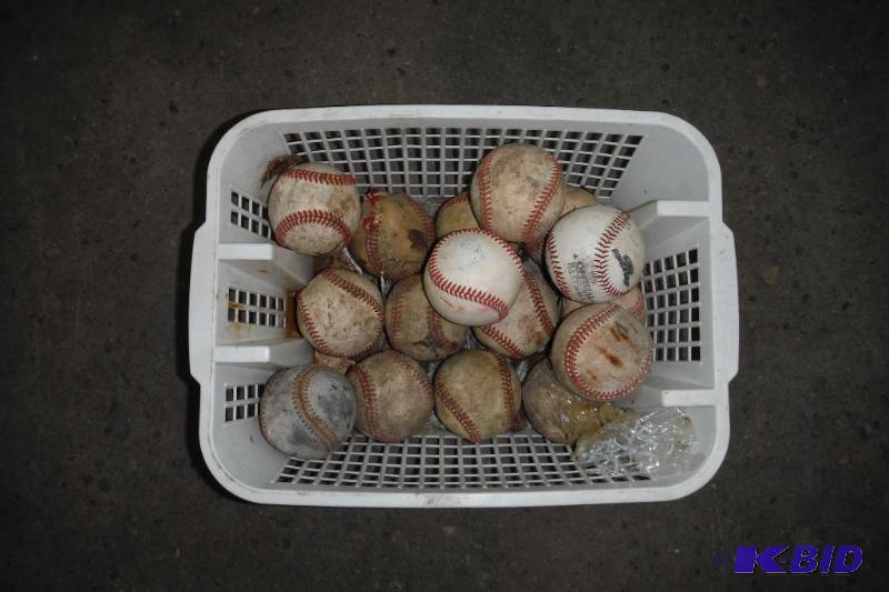 Basket of baseballs