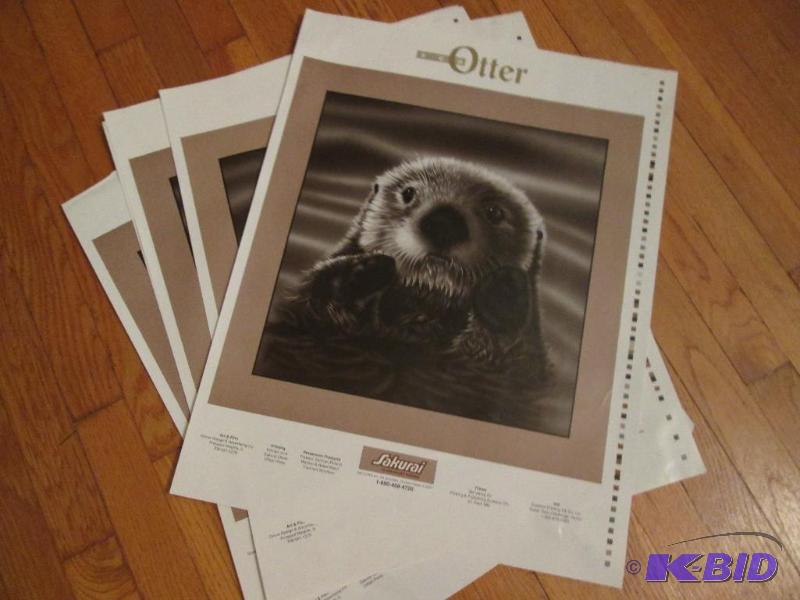 Five 17  in x 22  in sea otter posters...