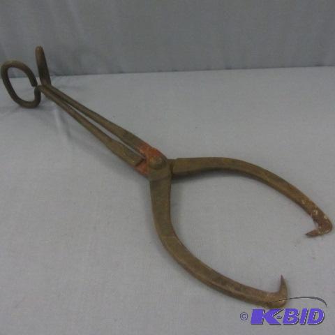 lot 33 image: Primitive Ice Tongs